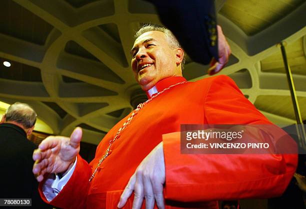 Mexico's newly appointed cardinal Francisco Robles Ortega shakes hands during the traditionnal courtesy visit, 24 November 2007 in Vatican....