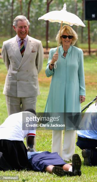 Prince Charles, Prince of Wales and Camilla, Duchess of Cornwall watch a first Aid demonstration during a visit to St Joseph's School on November 24,...