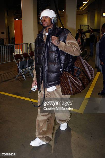 Allen Iverson of the Denver Nuggets arrives before the game on November 24, 2007 at the Toyota Center in Houston, Texas. NOTE TO USER: User expressly...