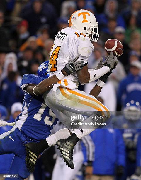 Eric Berry of the Tennessee Volunteers knocks away a pass intended for Keenan Burton of the Kentucky Wildcats during the SEC game at Commonwealth...