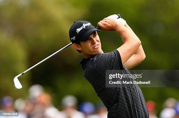 Aaron Baddeley of Australia hits his second shot on the sixth hole during round four of the MasterCard Masters at Huntingdale Golf Course on November...