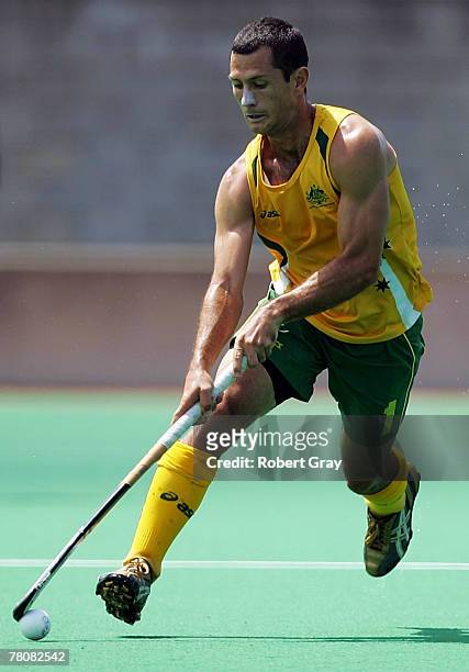 Jamie Dwyer of Australia runs with the ball during the third test match between the Australian Kookaburras and the New Zealand Black Sticks at the...
