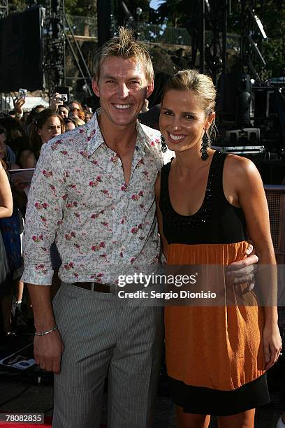 Australian cricketer Brett Lee and partner Liz Kemp attend the 2007 Australian Idol grand final at the Sydney Opera House on November 25, 2007 in...