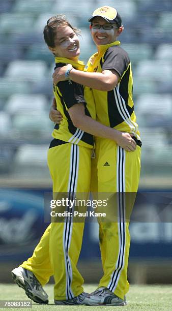 Lauren Stammers and Lauren Ebsary of the Fury celebrate a wicket during the Women's National Cricket League match between the Western Fury and the...