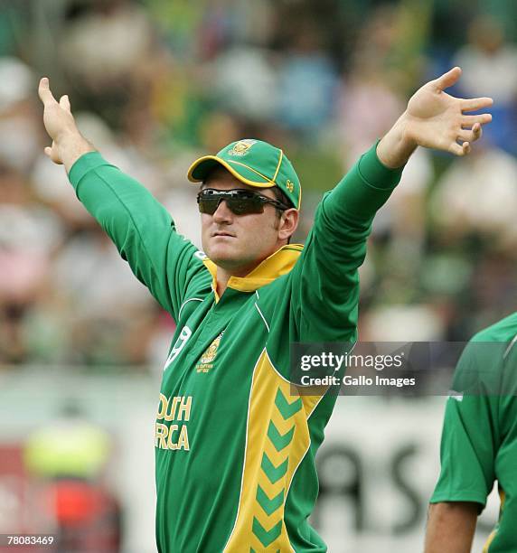 Graeme Smith of South Africa waves his arms on his 100th ODI match during the first ODI match between South Africa and New Zealand held at Sarhara...