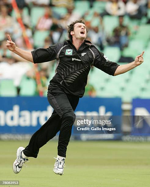 Kyle Mills of New Zealand celebrate the wicket of Jacques Kallis of south Africa leaves the field out for 40 runs during the first ODI match between...