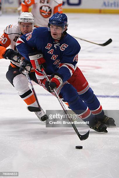Jaromir Jagr of the New York Rangers controls the puck during the NHL game against the New York Islanders at Madison Square Garden on November 19,...