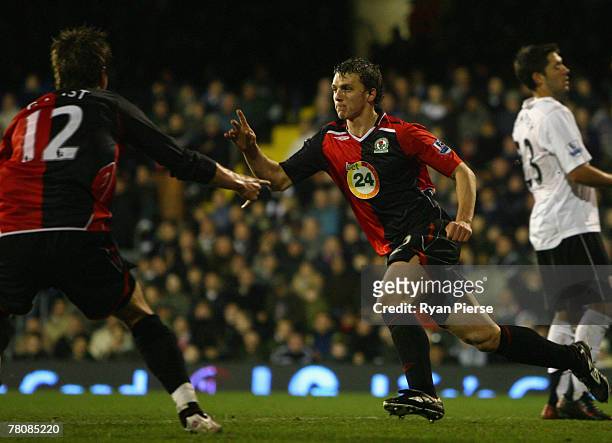Stephen Warnock of Blackburn Rovers celebrates as he scores their second goal during the Barclays Premier League match between Fulham and Blackburn...