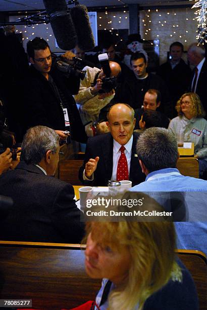 Former New York Mayor and presidential hopeful Rudy Giuliani speaks with diners at Susie's Diner November 25, 2007 in Hudson, New Hampshire. Giuliani...