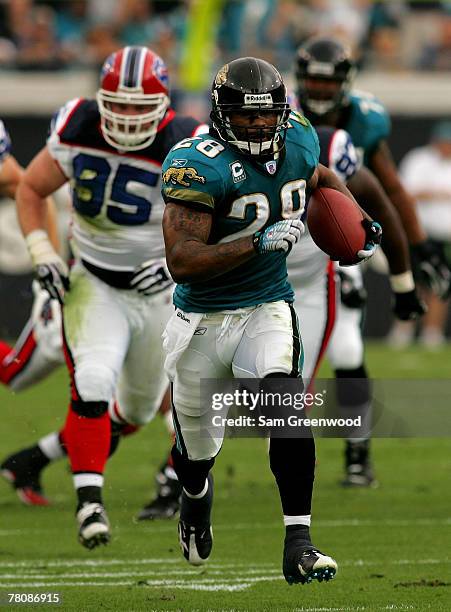 Fred Taylor of the Jacksonville Jaguars runs for a touchdown in a game against the Buffalo Bills at Jacksonville Municipal Stadium November 25, 2007...