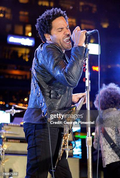 Musician Lenny Kravitz performs during the halftime show at the CFL's 95th Grey Cup Championship at the Rogers Centre on November 25, 2007 in...