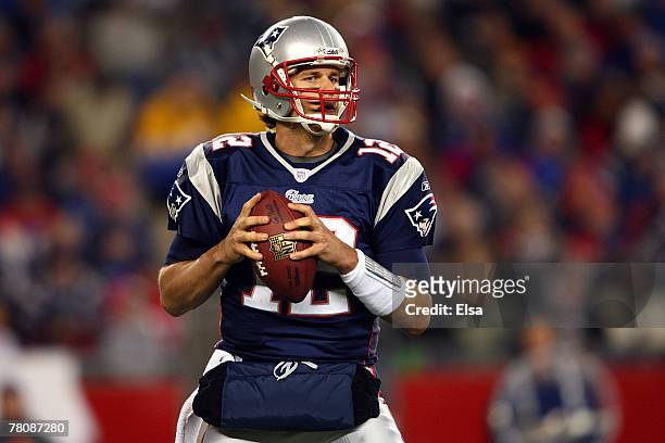 Tom Brady of the New England Patriots drops back against the Philadelphia Eagles at Gillette Stadium on November 25, 2007 in Foxboro, Massachusetts.