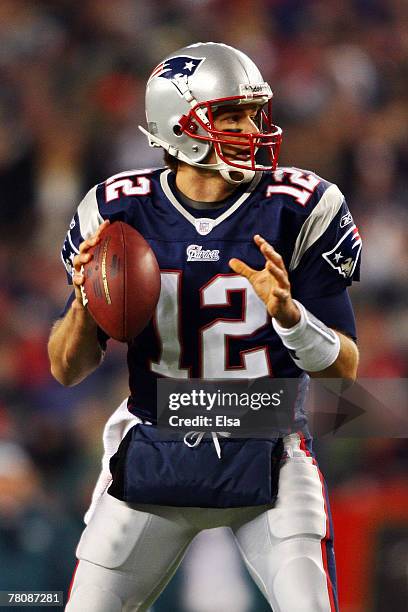 Tom Brady of the New England Patriots drops back against the Philadelphia Eagles at Gillette Stadium on November 25, 2007 in Foxboro, Massachusetts.