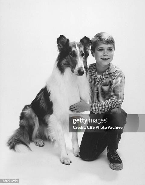 Promotional portrait of American animal actor Baby, as Lassie, and child actor Jon Provost, as Timmy, in the television series 'Lassie,' 1959.