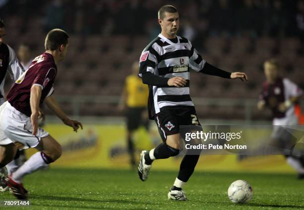 Tommy Wright of Darlington in action during the F.A.Cup Sponsored by E.ON First Round Replay Match between Northampton Town and Darlington at...