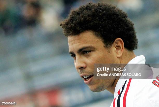 Milan's Brazilian forward Ronaldo looks on during his Italian serie A football match against Cagliari at Cagliari's Sant' Elia stadium, 25 November...