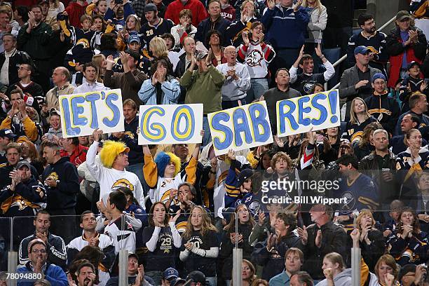 Fans of the Buffalo Sabres celebrate a goal against the Washington Capitals during the NHL game on October 13, 2007 at HSBC Arena in Buffalo, New...