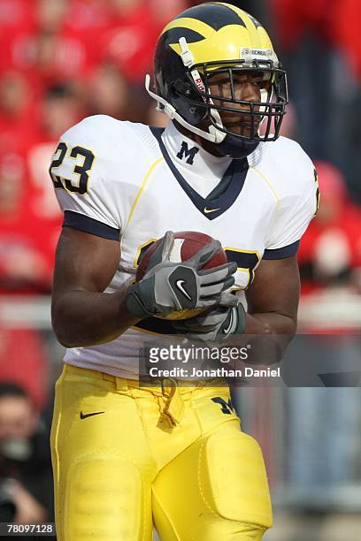Carlos Brown of the Michigan Wolverines carries the ball during the game against the Wisconsin Badgers at Camp Randall Stadium on November 10, 2007...