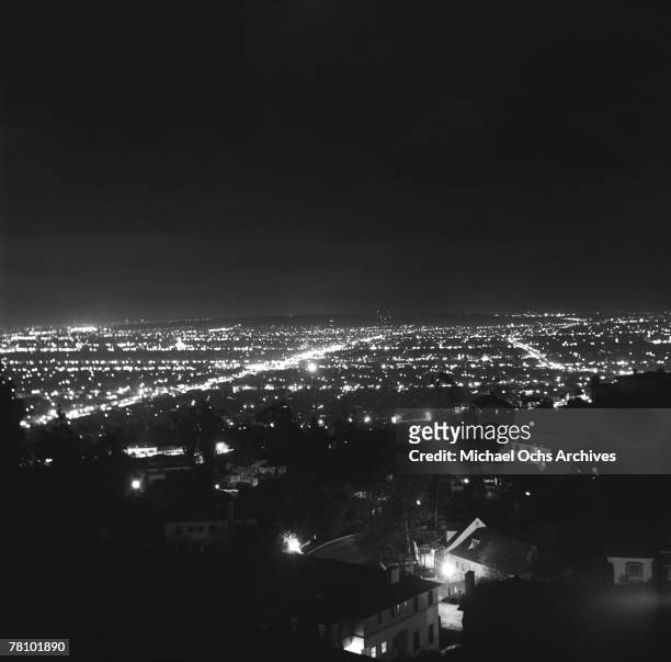 View from Mulholland Drive overlooking the city at night on June 7 1951 in Los Angeles California.