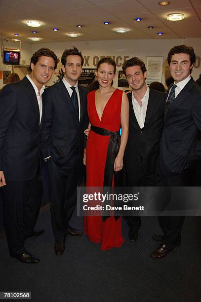 Actress Amy Carson poses with members of the classical singing group Blake Stephen Bowman, Dominic Tighe, Jules Knight, and Oliver Baines at the UK...