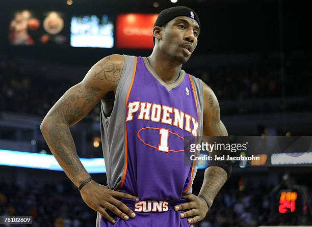 Amare Stoudemire of the Phoenix Suns looks on against of the Golden State Warriors on November 26, 2007 at Oracle Arena in Oakland, California. NOTE...