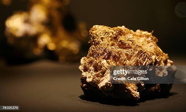 In the foreground lies a piece of English gold from Hope's nose in Devon which is on display at the Vault at the Natural History Museum, on November...