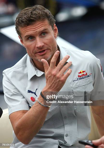 David Coulthard of the Red Bull Formula One Team gesture during the Puma Red Bull Collection Launch at the Hangar 7 on November 27, 2007 in Salzburg,...