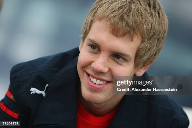 Sebastian Vettel of the Torro Rosso Formula One Team smiles during the Puma Red Bull Collection Launch at the Hangar 7 on November 27, 2007 in...