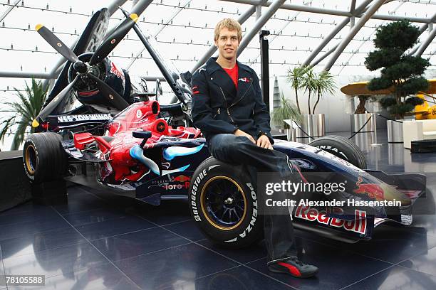 Sebastian Vettel of the Torro Rosso Team poses during the Puma Red Bull Collection Launch at the Hangar 7 on November 27, 2007 in Salzburg, Austria.