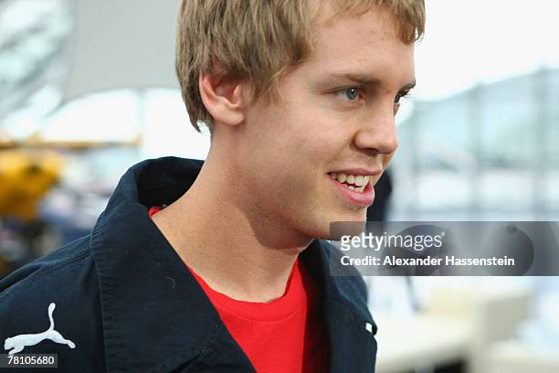 Sebastian Vettel of the Torro Rosso Team smiles during the Puma Red Bull Collection Launch at the Hangar 7 on November 27, 2007 in Salzburg, Austria.