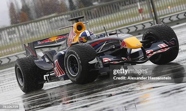 David Coulthard of the Red Bull Formula One Team in action during the Puma Red Bull Collection Launch at the Hangar 7 on November 27, 2007 in...