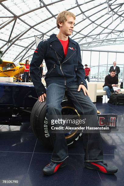 Sebastian Vettel of the Torro Rosso Team poses during the Puma Red Bull Collection Launch at the Hangar 7 on November 27, 2007 in Salzburg, Austria.
