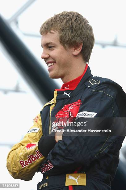 Sebastian Vettel of the Torro Rosso Team smiles during the Puma Red Bull Collection Launch at the Hangar 7 on November 27, 2007 in Salzburg, Austria.