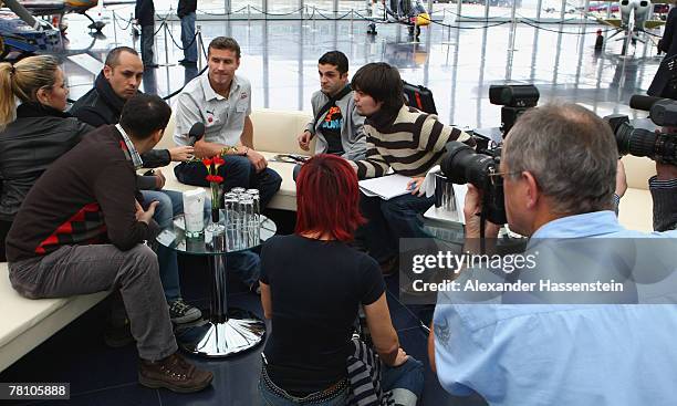 David Coulthard talks with the media during the Puma Red Bull Collection Launch at the Hangar 7 on November 27, 2007 in Salzburg, Austria.