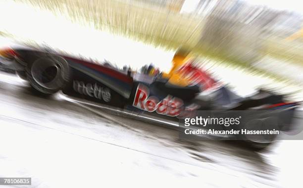 David Coulthard of the Red Bull Formula One Team in action during the Puma Red Bull Collection Launch at the Hangar 7 on November 27, 2007 in...