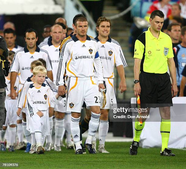 Galaxy player David Beckham arrives in the stadium prior to the start of the Hyundai Club Challenge match between Sydney FC and the LA Galaxy at...