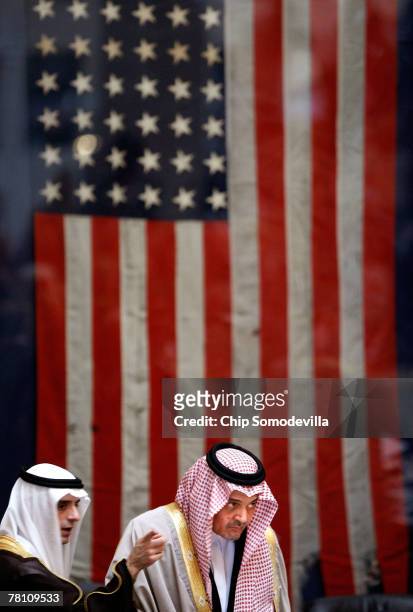 Saudi Arabian ambassador to the United States Adel al-Jubeir talks with Saudi Arabian Foreign Affairs Minister Saud Al-Faisal during the opening...