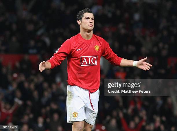 Cristiano Ronaldo of Manchester United celebrates scoring their second goal during the UEFA Champions League match between Manchester United and...