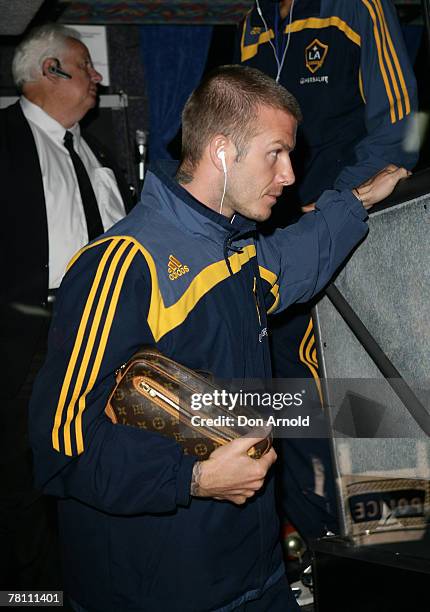 David Beckham arrives on the team bus ahead of the Hyundai Club Challenge match between Sydney FC and the LA Galaxy at Telstra Stadium on November...