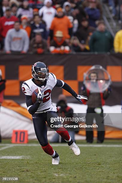 Punt returner Jacoby Jones of the Houston Texans runs with the football during a game against the Cleveland Browns at Cleveland Browns Stadium on...