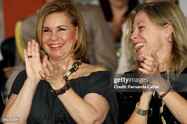 Grand Duchess Maria Theresa of Luxembourg sits beside Marie Pierre Poirier, the UNICEF representative for Brazilduring a visit to the CEFRAN - Centro...