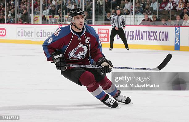 Joe Sakic of the Colorado Avalanche skates against the Calgary Flames at the Pepsi Center on November 24, 2007 in Denver, Colorado. The Flames...