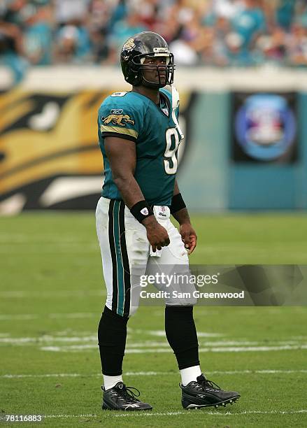 David Garrard of the Jacksonville Jaguars looks over the defense in a game against the Buffalo Bills at Jacksonville Municipal Stadium in...