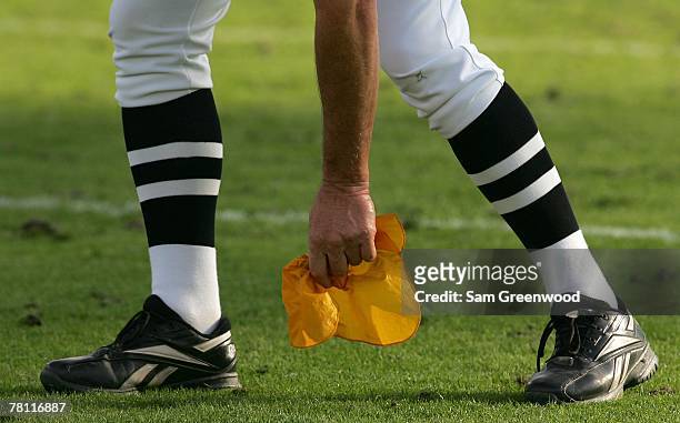 Referee picks up a penalty flag in a game at Jacksonville Municipal Stadium in Jacksonville, Florida on November 25, 2007. The Jaguars beat the Bills...