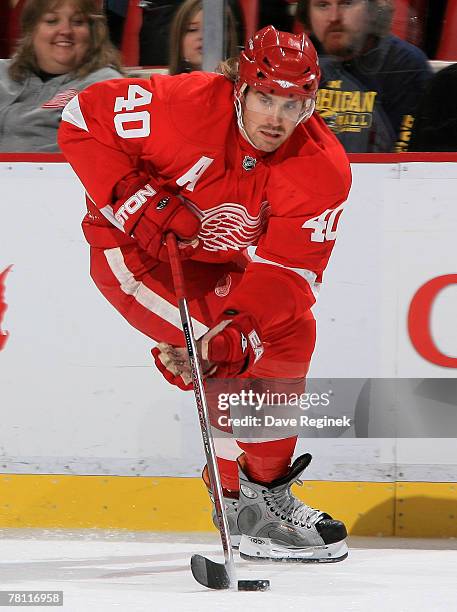 Henrik Zetterberg of the Detroit Red Wings skates up ice during an NHL game against the Calgary Flames on November 27, 2007 at Joe Louis Arena in...