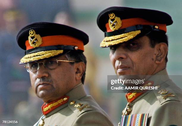 Pakistani newly appointed army chief General Ashfaq Kiyani and President Pervez Musharraf stand after the change of command ceremony in Rawalpindi,...