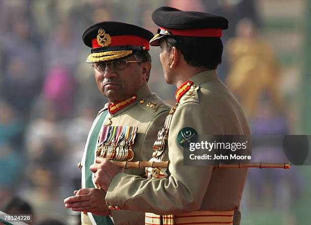 President Pervez Musharraf speaks with the new Pakistani army chief Gen. Ashfaq Kayani at a change of command ceremony November 28, 2007 in...