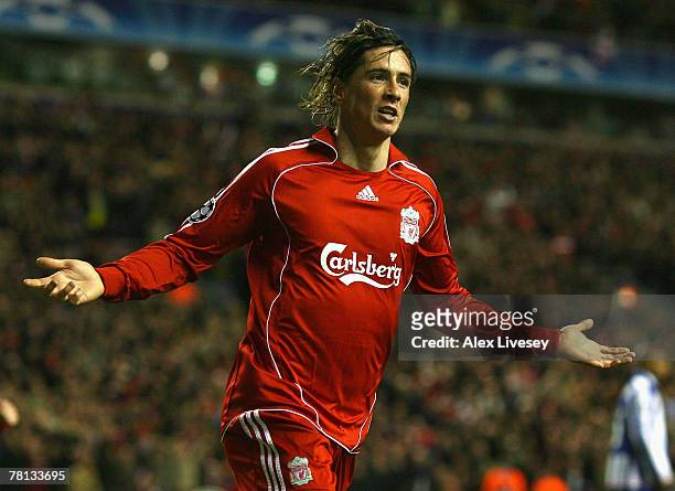Fernando Torres of Liverpool celebrates scoring the opening goal during the UEFA Champions League Group A match between Liverpool and FC Porto at...
