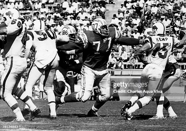 San Diego Chargers defensive tackle Ernie Ladd closes in on Buffalo Bills quarterback Jack Kemp during a 14-10 Chargers victory on September 8 at...