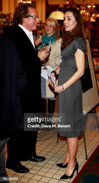 Alistair Morrison and Kate Middleton attend the book launch party of 'Time To Reflect' by photographer Alistair Morrison, at Bluebird on November 28,...